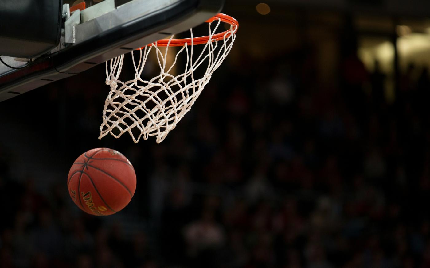 ball under basketball ring by Markus Spiske courtesy of Unsplash.